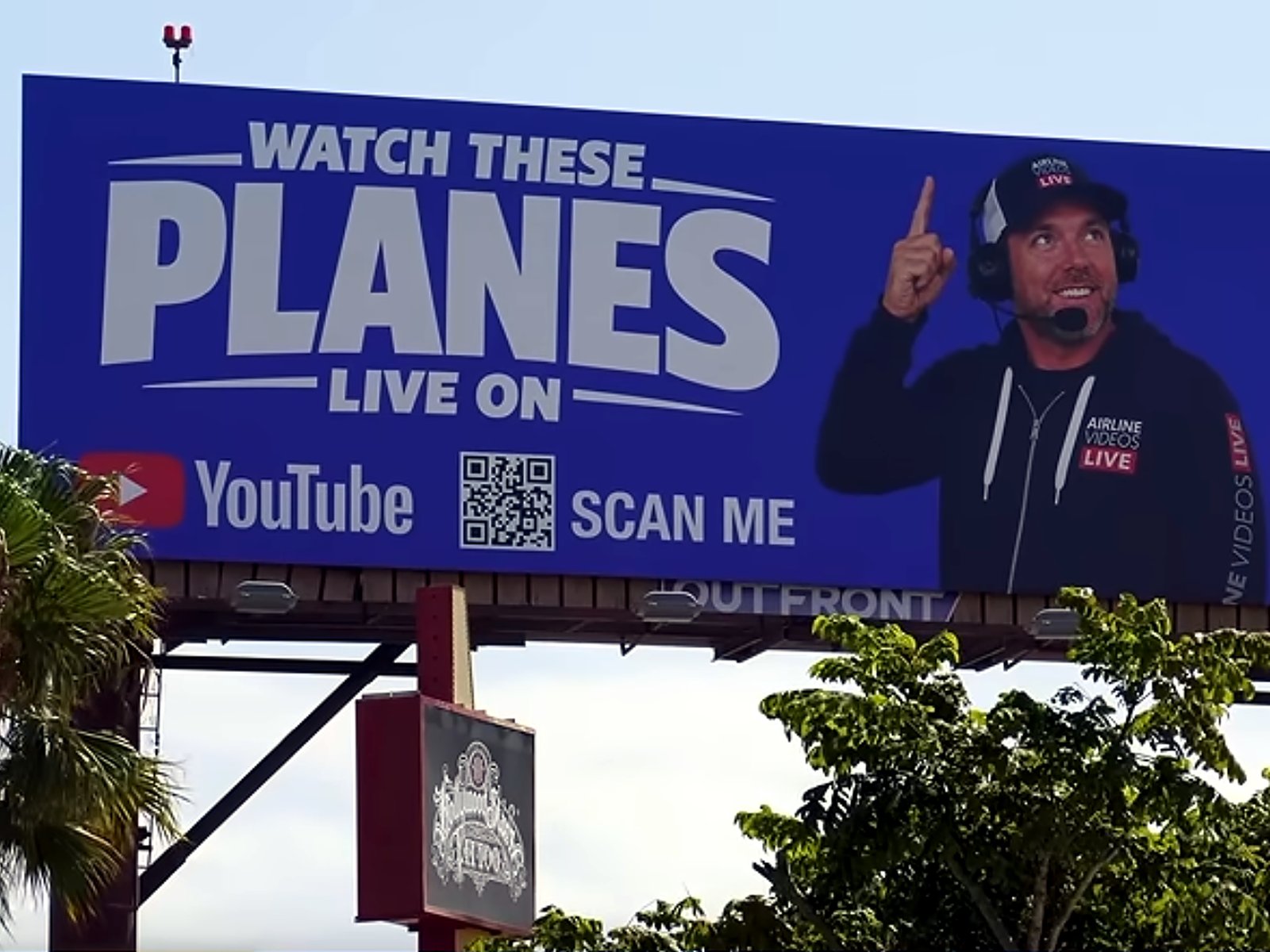 The installed Airline Videos Live billboard in Los Angeles — a 14 by 48 foot board built to OUTFRONT's print spec